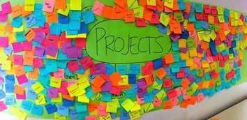 Wall of colourful sticky notes under the heading Projects